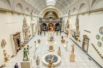 Museum hall with sculptures and architectural fragments.