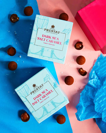 Two boxes of dark sea salt caramel truffles.