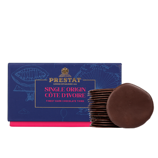 Prestat Chocolates London | Wafer Thin Chocolate Discs fall from the sky. The thinnest, crispiest, guilt-free chocolate.