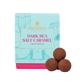 Prestat Chocolates London | Truffles fall from the sky, revealing a delicious pink marc de champagne ganache. 