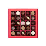 inside of prestat chocolate box with assortment of chocolate truffles