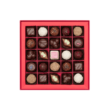 inside of prestat chocolate box with assortment of chocolate truffles