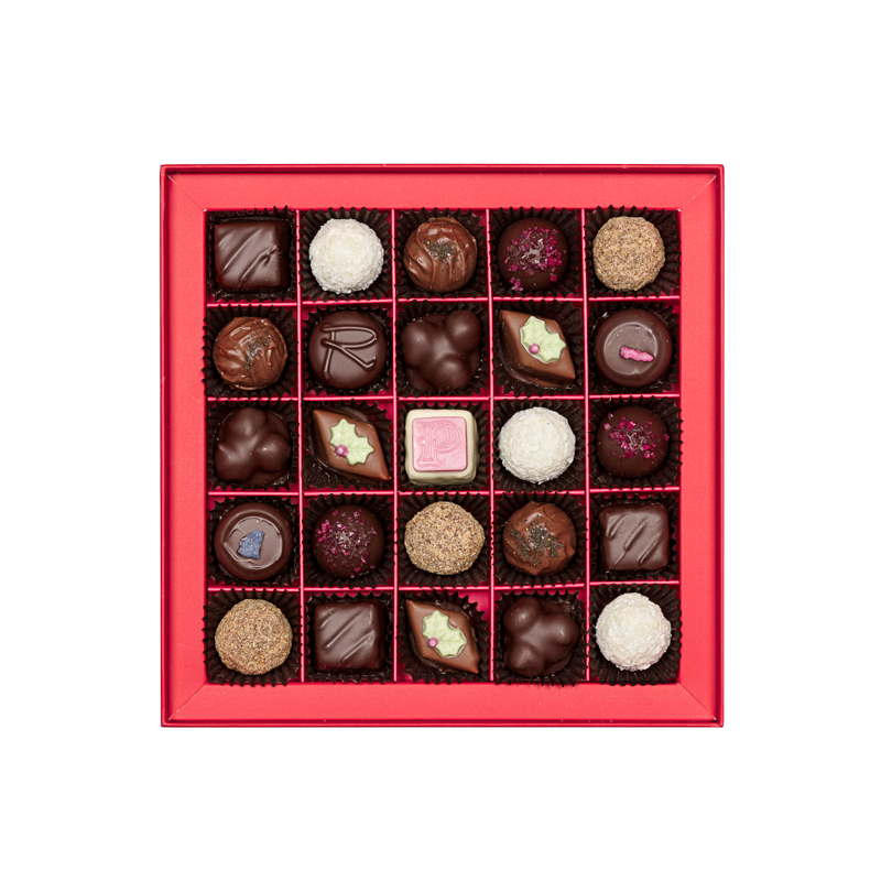 inside of prestat chocolate box with assortment of chocolate truffles