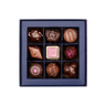 inside of prestat small jewel box with assorted chocolates