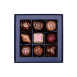 inside of prestat small jewel box with assorted chocolates