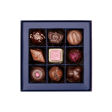 inside of prestat small jewel box with assorted chocolates