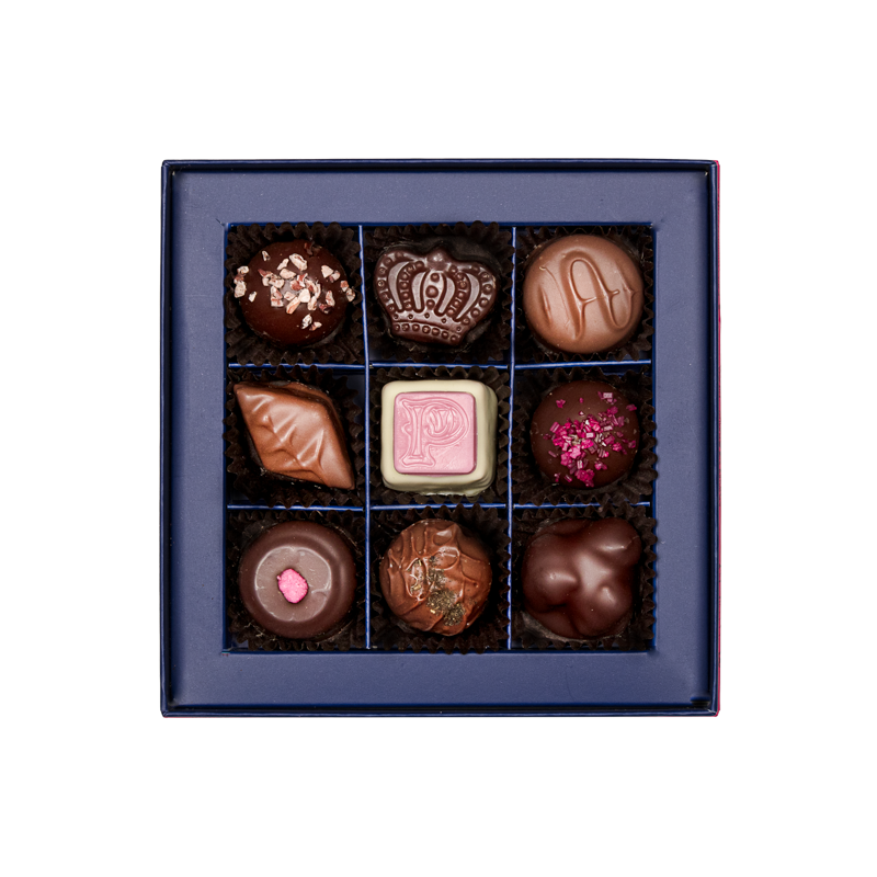 inside of prestat small jewel box with assorted chocolates