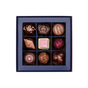 inside of prestat small jewel box with assorted chocolates