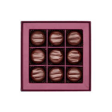 box round chocolate candies By Prestat Chocolates