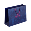 blue bag pink handles By Prestat Chocolates