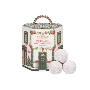 Prestat Chocolates London | Delicious Pink Marc de Champagne Truffles encased in a Festive House. Christmas Chocolates, order online, free delivery for orders £45 and up. 